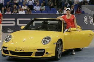 Lani je športni avto Porsche 911 odpeljala Justine Henin