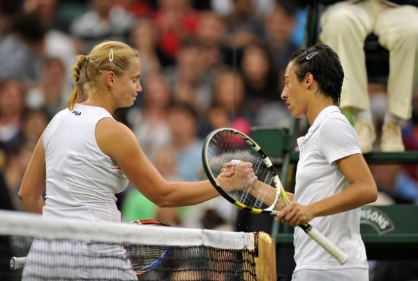 Kvaliteten obračun na osrednjem igrišču med Francesco Schiavone in Jeleno Dokić je dobila Italijanka