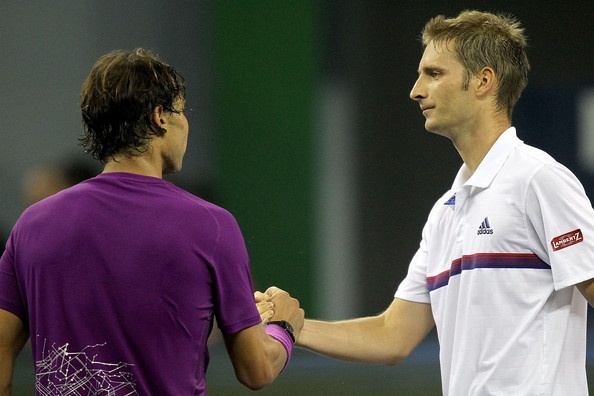 Florian Mayer je iz turnirja vrgel 1. nosilca in 2. igralca sveta Rafaela Nadala