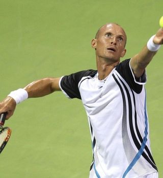 Davidenko: Vedel sem, da ga lahko premagam; Federer: Kapo dol