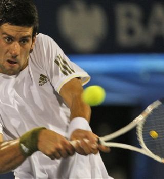 Novak brez težav čez Italijana