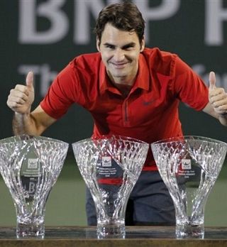 VIDEO in FOTO: Velikemu Federerju kar tri nagrade!