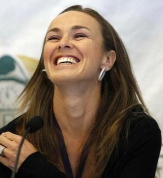 Martina Hingis je izgubila oba dvoboja, a je Švica vseeno presenetila favorizirano Poljsko v gosteh!