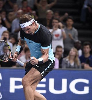 Nadal z izjemnim inside-out forehandom ubranil zaključno žogico