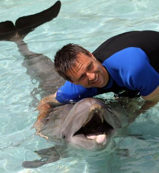 FOTO! Gonzalez, Soderling, Ferrer plavali z delfini!