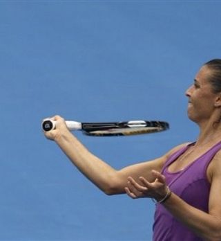 Gladek izpad Flavie Pennette; V moški konkurenci slovo Berdycha in Troickega