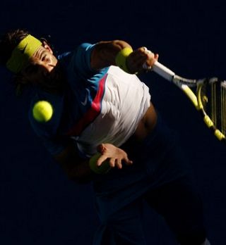Nadal ekspresno v četrtfinale, Simon pa po predaji Monfilsa