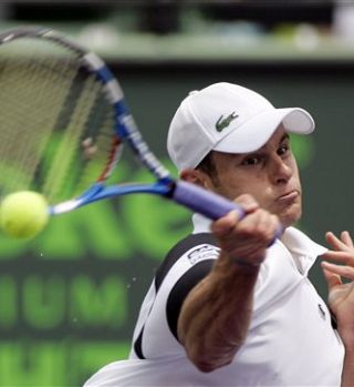 Federer zanesljivo v četrtfinale, kjer je tudi Roddick