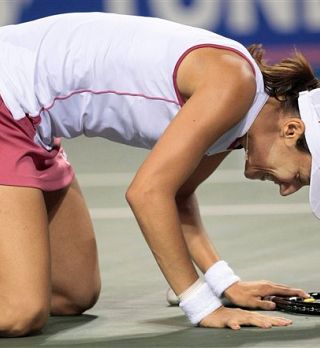 Katarina Srebotnik padla po težkem boju