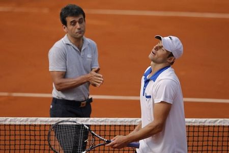 Roddick že 1. dan odpadel na pariškem pesku