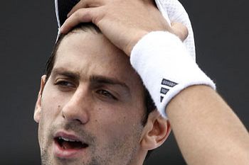 Novak Djokovič padel že na 1. oviri